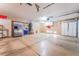 Spacious three car garage with water filtration system, cabinets, and shelving at 5217 Cold River Ave, Las Vegas, NV 89130