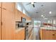 Well-lit kitchen with a central island, modern appliances, and plenty of cabinet space at 5217 Cold River Ave, Las Vegas, NV 89130