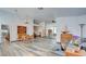 Open-concept living area with views of a fireplace, backyard, and natural light through windows at 5217 Cold River Ave, Las Vegas, NV 89130
