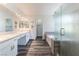 This primary bathroom has dual sinks, a shower, and a separate tub at 5217 Cold River Ave, Las Vegas, NV 89130