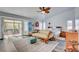 Comfortable main bedroom with access to a private outdoor hot tub area and serene decor at 5217 Cold River Ave, Las Vegas, NV 89130
