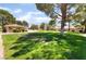 Community park and grass area featuring mature shade trees and a gazebo at 5217 Cold River Ave, Las Vegas, NV 89130