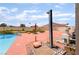 Outdoor shower and manicured yard by pool, complete with lounge space, perfect for rinsing off after a swim at 5217 Cold River Ave, Las Vegas, NV 89130