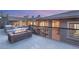 Fire pit feature in backyard space of modern house and steel railing, perfect for outdoor entertainment at 540 Regents Gate Dr, Henderson, NV 89012