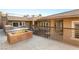 Fire pit feature in backyard space of modern house and steel railing, perfect for outdoor entertainment at 540 Regents Gate Dr, Henderson, NV 89012