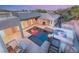 Aerial view of modern backyard with pool, spa, and outdoor kitchen at 540 Regents Gate Dr, Henderson, NV 89012