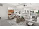 Bright, open-concept living room featuring modern decor and a seamless flow to the kitchen at 540 Regents Gate Dr, Henderson, NV 89012