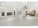 Unstaged living room with white walls and staircase at 540 Regents Gate Dr, Henderson, NV 89012
