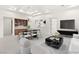 Staged living room and dining area featuring modern décor and ample natural light at 540 Regents Gate Dr, Henderson, NV 89012