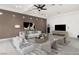 Staged living room featuring modern decor, recessed lighting, and an accent wall at 540 Regents Gate Dr, Henderson, NV 89012