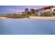 A sprawling roof deck provides a unique vantage point for enjoying the scenic mountain and neighborhood views at 540 Regents Gate Dr, Henderson, NV 89012