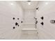 Spacious shower featuring a rainfall shower head, multiple body sprayers, and built-in seating at 540 Regents Gate Dr, Henderson, NV 89012