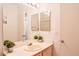 Bathroom with a well-lit vanity and a large mirror at 5415 W Harmon Ave # 1119, Las Vegas, NV 89103