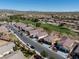 Aerial view of a beautiful neighborhood with a golf course at 5675 E La Campana Dr, Pahrump, NV 89061