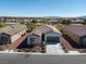 Attractive single-story home featuring a low-maintenance yard and a two-car garage at 5675 E La Campana Dr, Pahrump, NV 89061