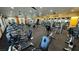 Community gym featuring cardio machines and weight lifting equipment in a well-lit space at 5675 E La Campana Dr, Pahrump, NV 89061