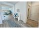 Hallway featuring a bench and decor leading to the living room and other rooms at 5675 E La Campana Dr, Pahrump, NV 89061