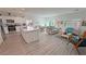 Bright kitchen featuring stainless appliances, island and adjoining living space at 5675 E La Campana Dr, Pahrump, NV 89061