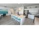 Well-lit kitchen boasts stainless appliances, a large island, and modern finishes at 5675 E La Campana Dr, Pahrump, NV 89061