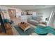 Spacious living area with open floor plan to the kitchen and neutral, modern decor at 5675 E La Campana Dr, Pahrump, NV 89061
