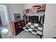 Well-organized walk-in closet with a futon, an electric fireplace and ample storage solutions at 5675 E La Campana Dr, Pahrump, NV 89061