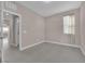 Neutral bedroom with tile flooring and a window providing natural light at 5832 Sleepy Willow St, Las Vegas, NV 89148