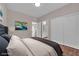 Comfortable bedroom features a plush bed, closet space, and tasteful decor at 5832 Sleepy Willow St, Las Vegas, NV 89148