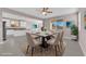 Elegant dining room featuring a modern table, stylish chairs, and plenty of natural light at 5832 Sleepy Willow St, Las Vegas, NV 89148