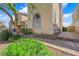 View of the exterior of the home, showcasing well-maintained landscaping and charming architectural details at 5832 Sleepy Willow St, Las Vegas, NV 89148