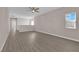 Open loft area showcasing modern wood flooring and abundant natural light, perfect for relaxation or entertainment at 5832 Sleepy Willow St, Las Vegas, NV 89148