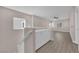 Bright loft space featuring built in cabinetry and hardwood floors, creating a cozy and functional area at 5832 Sleepy Willow St, Las Vegas, NV 89148