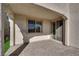 Covered patio with brick flooring and a sliding glass door at 5832 Sleepy Willow St, Las Vegas, NV 89148