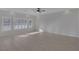 Large living space with tile floors and bright windows, offering plenty of light at 5977 Ancient Peaks Ave, Las Vegas, NV 89141