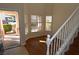 Open entryway with wood-look floors, windows, and a view of the home's exterior at 6020 Genovese Ave, Las Vegas, NV 89141
