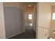 Hallway view showcases the open layout and access to different rooms at 6020 Genovese Ave, Las Vegas, NV 89141