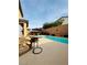 Secluded backyard with a refreshing pool, comfortable seating, and serene ambiance at 6495 Little Harbor Ct, Las Vegas, NV 89141
