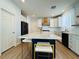 Elegant kitchen featuring a large island, stainless steel appliances, modern fixtures, and ample cabinet space at 6495 Little Harbor Ct, Las Vegas, NV 89141
