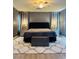 Comfortable main bedroom with soft lighting and a cozy rug at 6495 Little Harbor Ct, Las Vegas, NV 89141