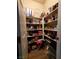 Walk-in pantry with custom shelving allowing for plenty of storage at 6495 Little Harbor Ct, Las Vegas, NV 89141