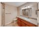 Bathroom featuring a granite vanity and a decorative mirror at 701 Capri Dr # 16B, Boulder City, NV 89005
