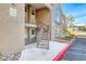Exterior angle of building featuring stairs, landscaping, and visible unit numbers at 701 Capri Dr # 16B, Boulder City, NV 89005