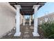 Charming backyard entrance with elegant pillars and a pergola-covered walkway, adding sophistication to the outdoor space at 8354 Woodland Prairie Ave, Las Vegas, NV 89129