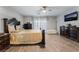 Spacious main bedroom featuring elegant furnishings, ceiling fan, and ample natural light at 8354 Woodland Prairie Ave, Las Vegas, NV 89129