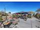 Serene backyard setting with a spacious paved patio, charming gazebo, and comfortable outdoor seating area, perfect for entertaining at 8365 Haven St, Las Vegas, NV 89123