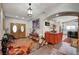Inviting foyer with decorative accents, a statement rug, and an open view to the kitchen at 8365 Haven St, Las Vegas, NV 89123
