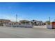 Wide angle of the home, showing the gated entry and horseshoe driveway at 8365 Haven St, Las Vegas, NV 89123