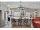 Bright kitchen featuring a large island with seating and stainless steel appliances at 8365 Haven St, Las Vegas, NV 89123