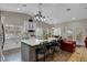 Bright kitchen featuring a large island with seating and stainless steel appliances at 8365 Haven St, Las Vegas, NV 89123