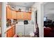 Functional laundry room with ample cabinets and modern washer and dryer at 8365 Haven St, Las Vegas, NV 89123