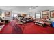 Spacious living room with ample seating, ceiling fans, and cozy decor at 8365 Haven St, Las Vegas, NV 89123